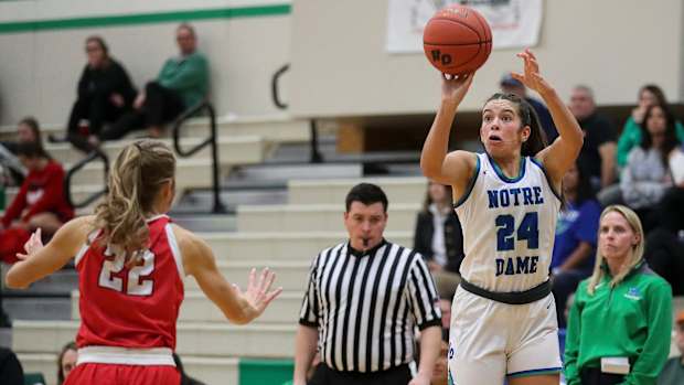 Notre Dame Academy's Gracie Grzesk (24) shoots a 3-pointer against Pulaski High School on Thursday, December 7, 2023, at Notre Dame in Green Bay, Wis. Notre Dame won the game, 57-17.